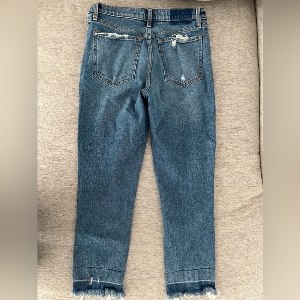 High waisted jeans, distressed. Straight leg. Like new.